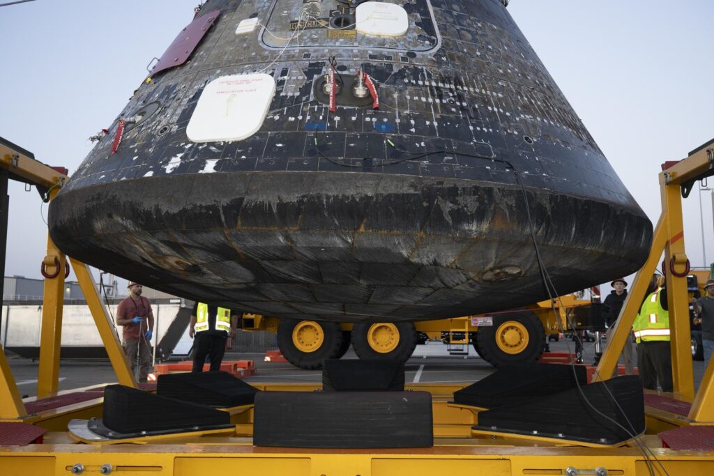 The Artemis II Orion crew module offloaded from the USS John P. Murtha