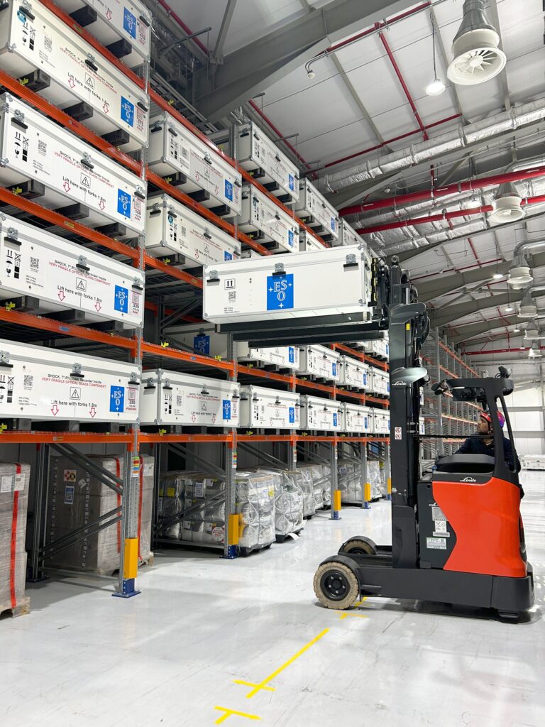 A box holding an ELT M1 mirror segment and its support on the large shelves at the ELT Technical Facility at Paranal