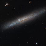 Hubble images a dust-lined galaxy, one of 111 done in a 260-galaxy survey