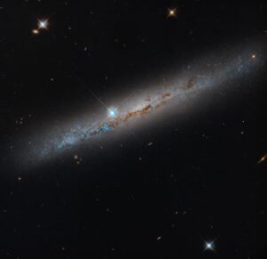Hubble images a dust-lined galaxy, one of 111 done in a 260-galaxy survey