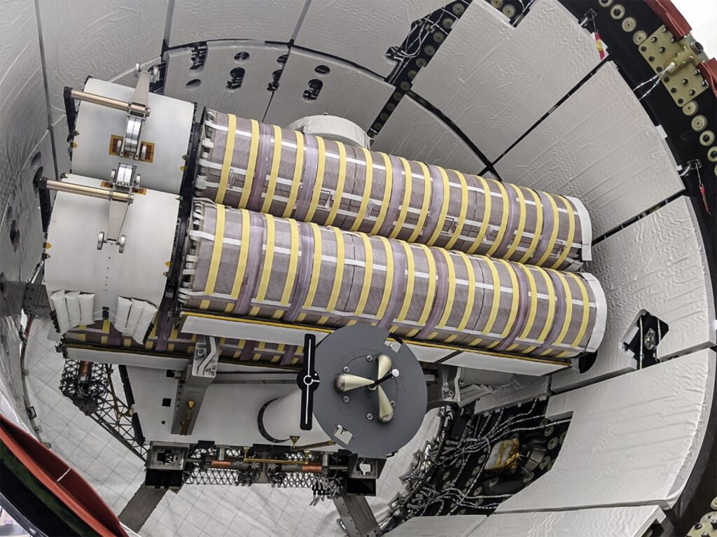 The first two Roll Out Solar Arrays loaded into the trunk of a SpaceX Dragon for the 2021 resupply mission