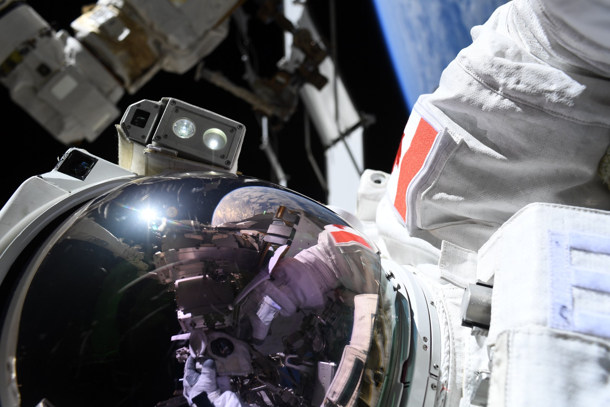 Canada’s Kutryk spends 7 hours 11 minutes outside the station on his first spacewalk