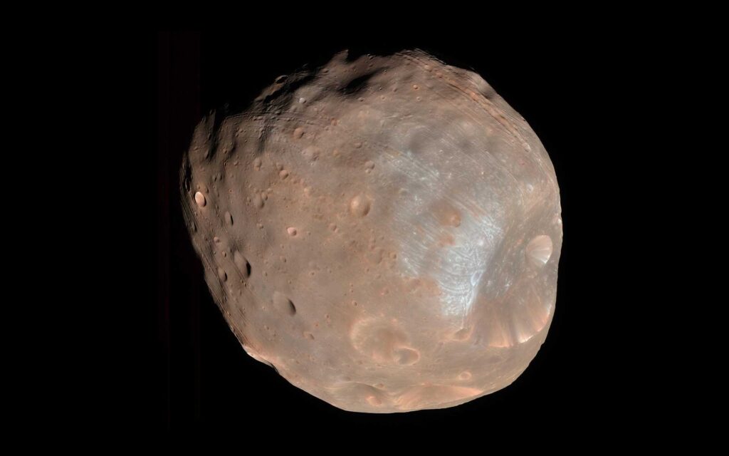 Phobos, the larger of Mars' two moons, imaged by the HiRISE camera on the Mars Reconnaissance Orbiter