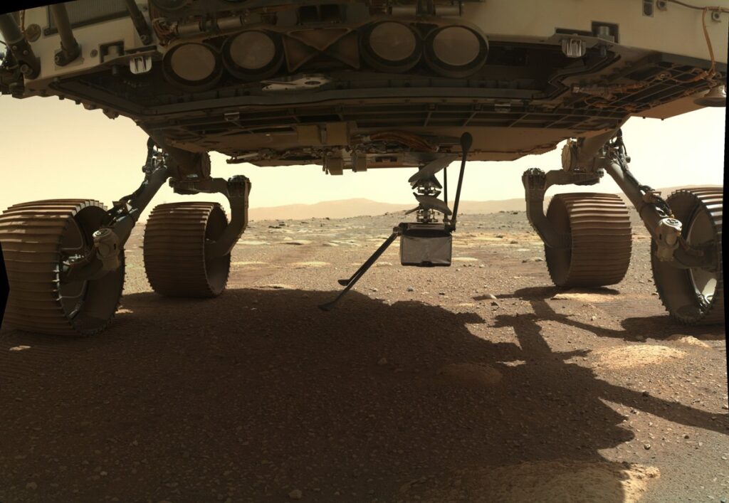 Ingenuity Mars helicopter extended vertically beneath the Perseverance rover before its deployment