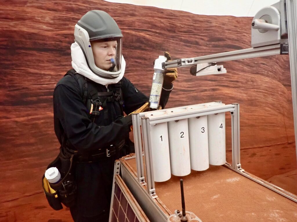 Flight engineer James Spicer taking part in a simulated extravehicular geological activity