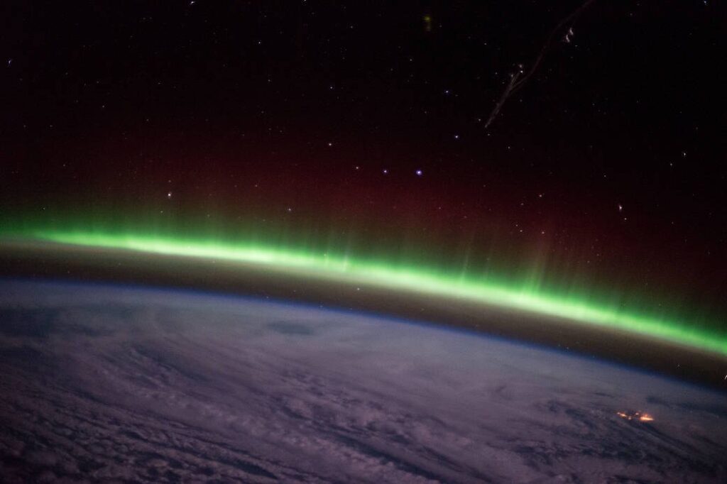 Aurora borealis seen from the cupola window of the International Space Station during Expedition 42