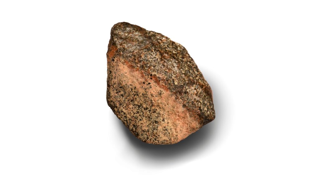 Close-up of Teghaza 001, a rose-colored Martian meteorite found in the Sahara