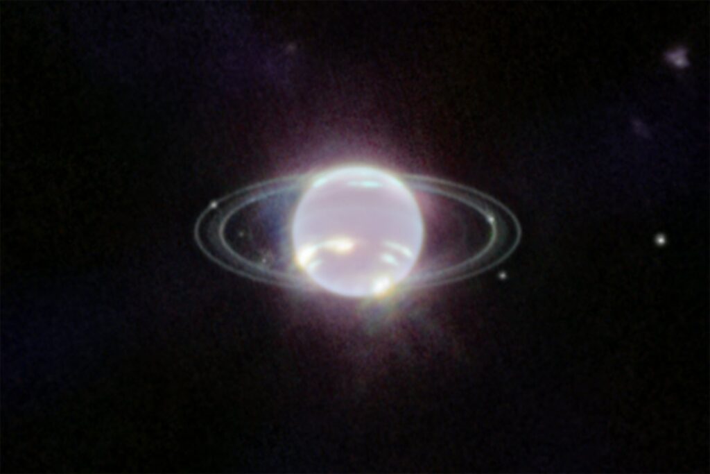 Webb near-infrared close-up of Neptune showing its rings, southern clouds and moons
